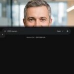 Профессиональный портрет уверенного бизнесмена Dynacams на размытом фоне в студийном освещении